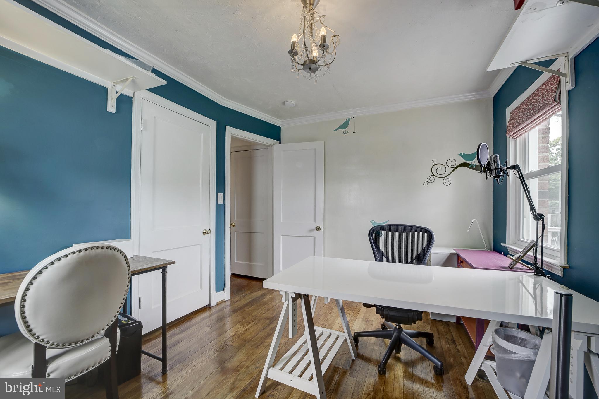 311 Timberwood Avenue Silver Spring, MD 20901 - Photo 21 of 44 a view of a dining room with furniture and wooden floor