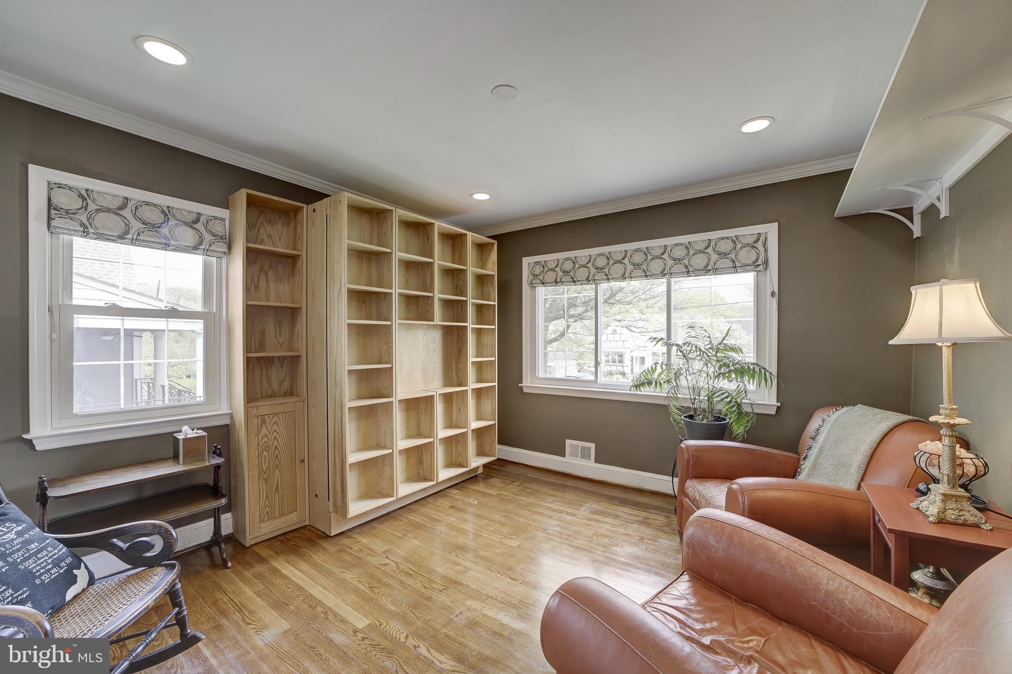 311 Timberwood Avenue Silver Spring, MD 20901 - Photo 22 of 44 a living room with furniture and a window
