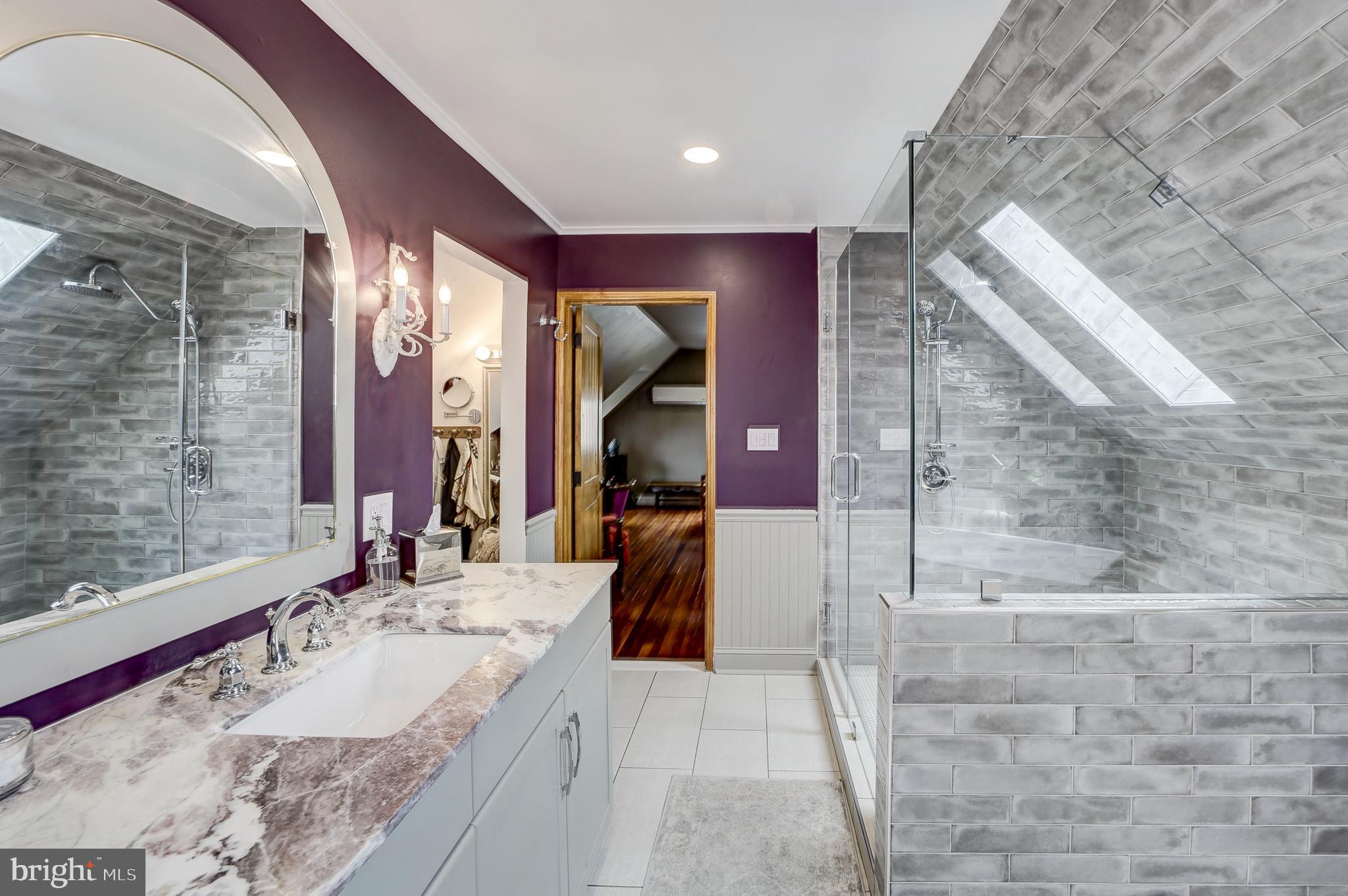 311 Timberwood Avenue Silver Spring, MD 20901 - Photo 31 of 44 a bathroom with a bathtub and a sink