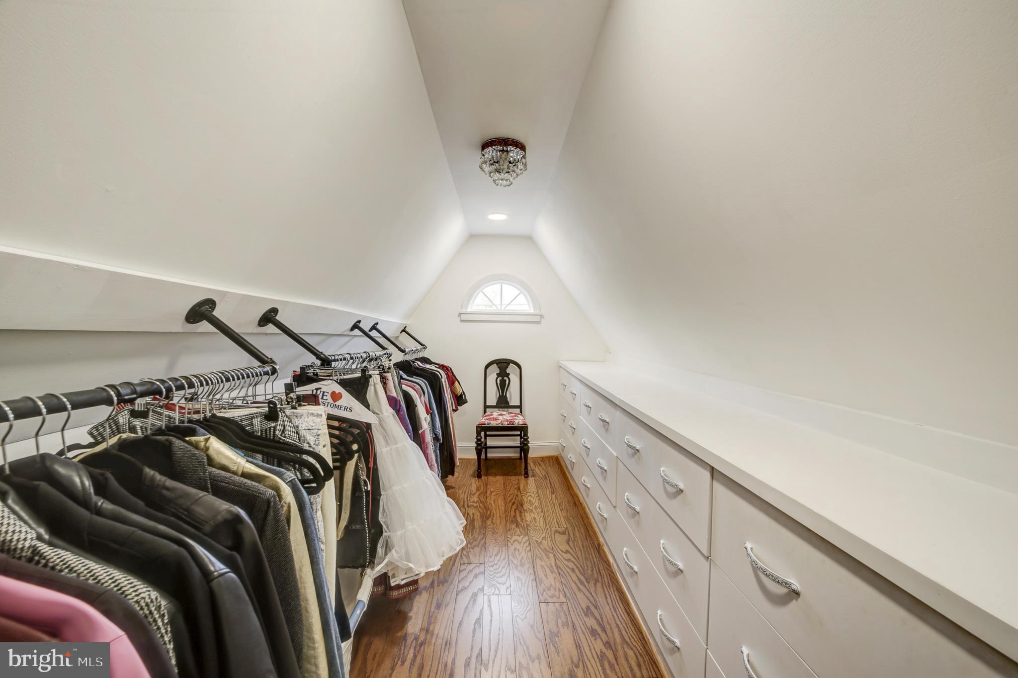 311 Timberwood Avenue Silver Spring, MD 20901 - Photo 33 of 44 a view of walk in closet with clothes and shoes