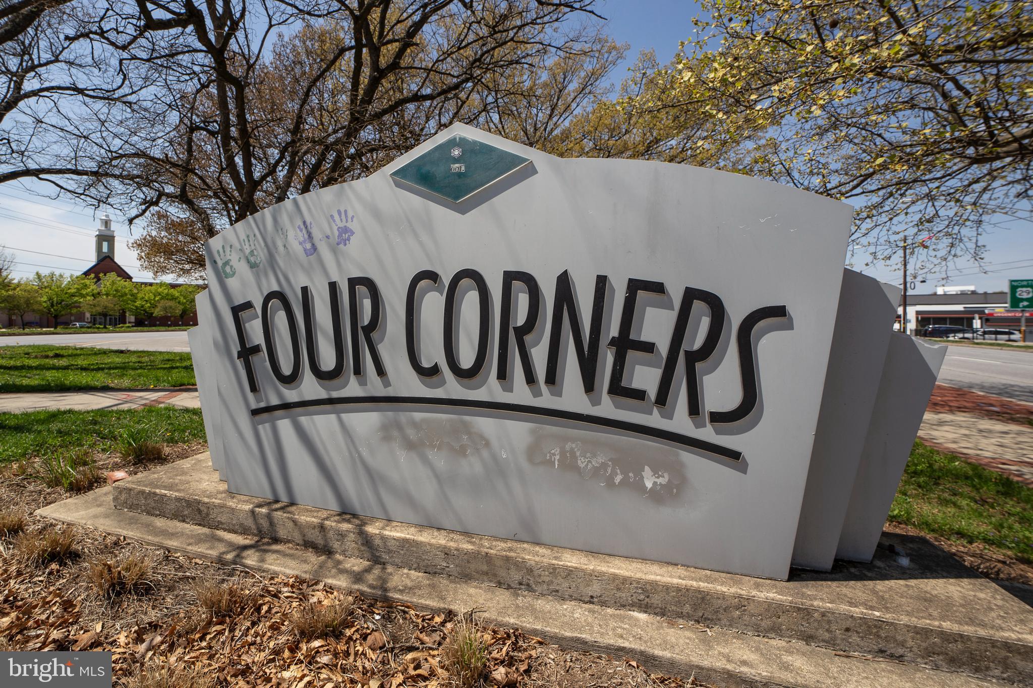311 Timberwood Avenue Silver Spring, MD 20901 - Photo 38 of 44 a view of outdoor space with a garden and signage