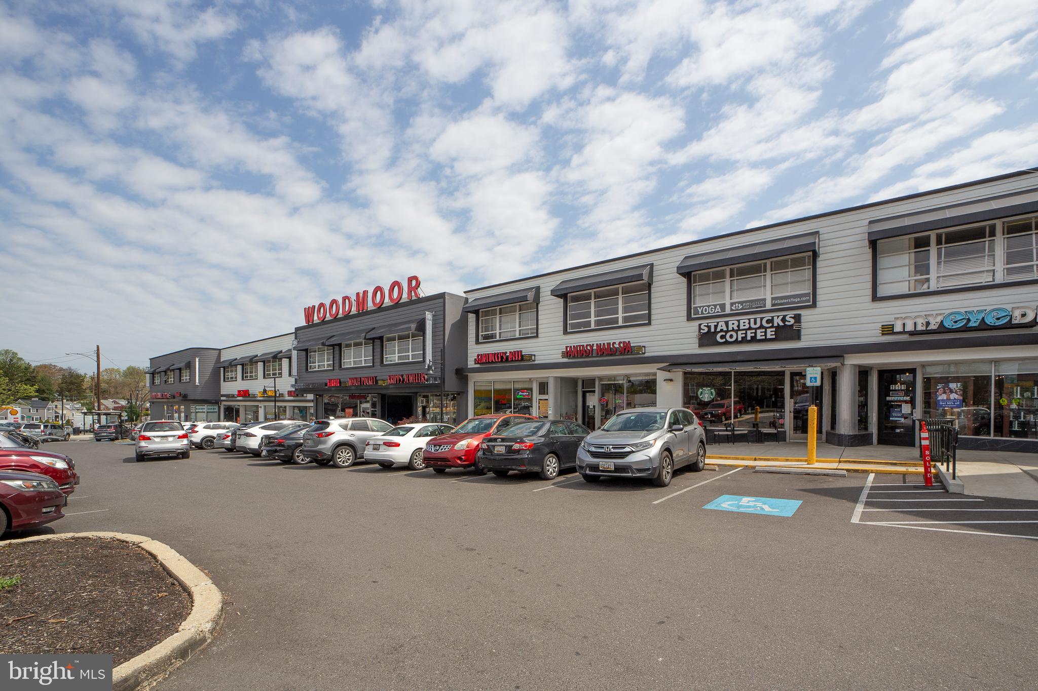 311 Timberwood Avenue Silver Spring, MD 20901 - Photo 39 of 44 a car parked in front of the building