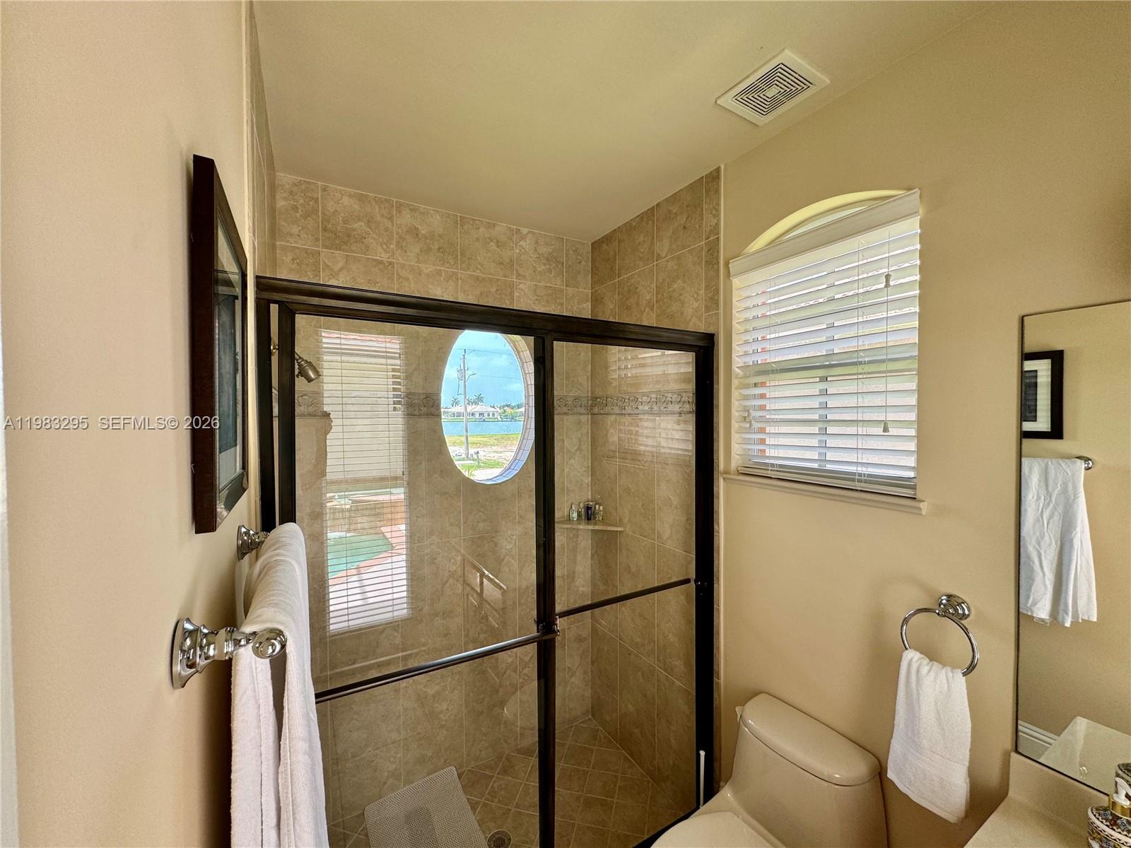 1740 Ludlow Road, Unit 1740 Marco Island, FL 34145 - Photo 18 of 58 a bathroom with a shower