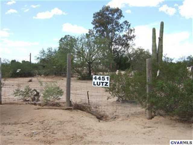 4451 East Lutz Road Sahuarita, AZ 85629 - Photo 1 of 1 a view of a park with large trees