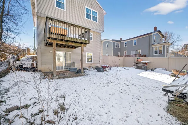 a view of a backyard with furniture