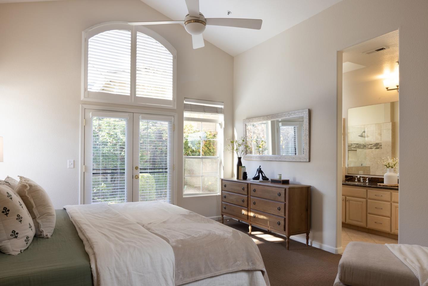 17776 Riverbend Road Salinas, CA 93908 - Photo 12 of 22 a bedroom with a bed and a couch