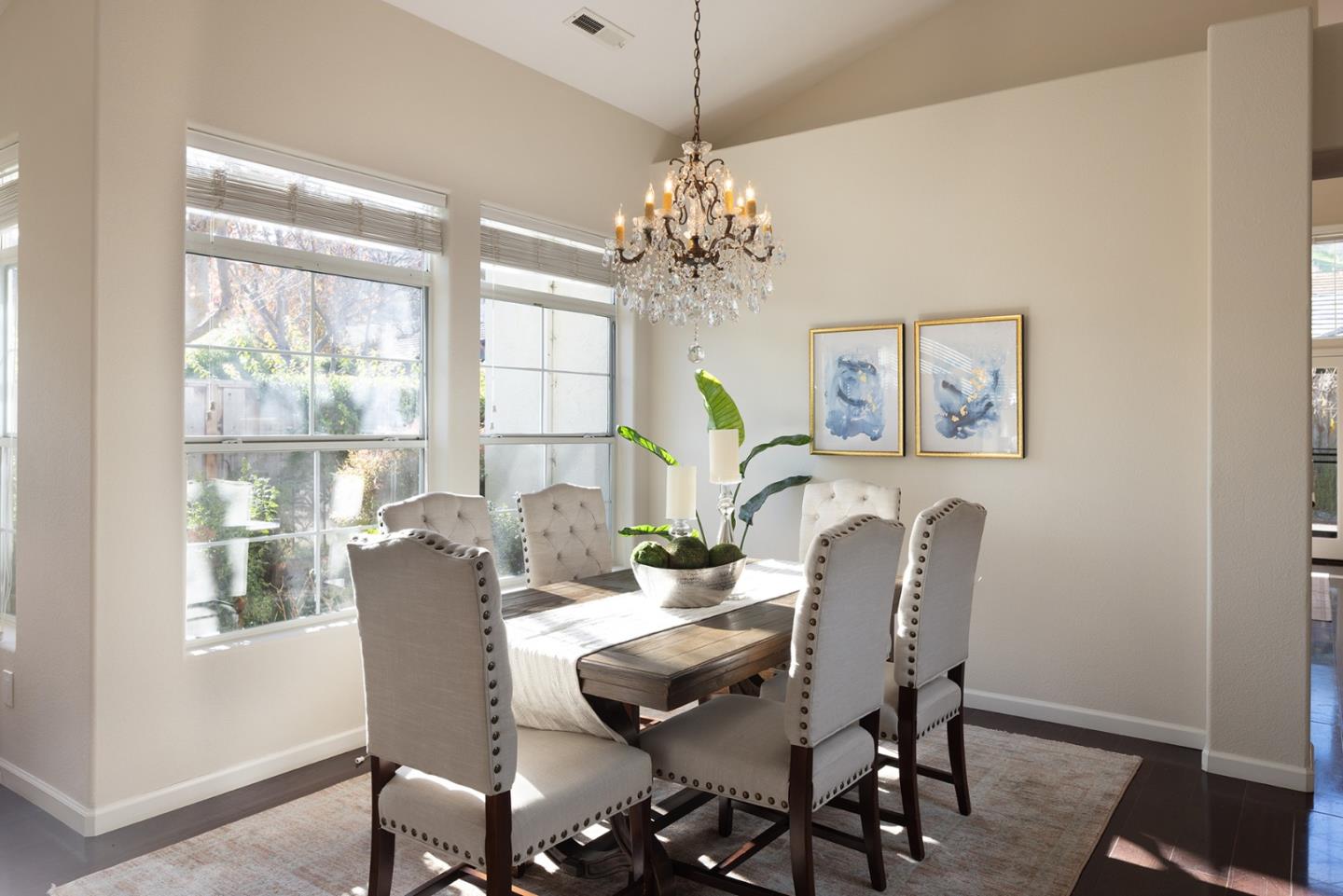 17776 Riverbend Road Salinas, CA 93908 - Photo 6 of 22 a view of a dining room with furniture a chandelier and wooden floor