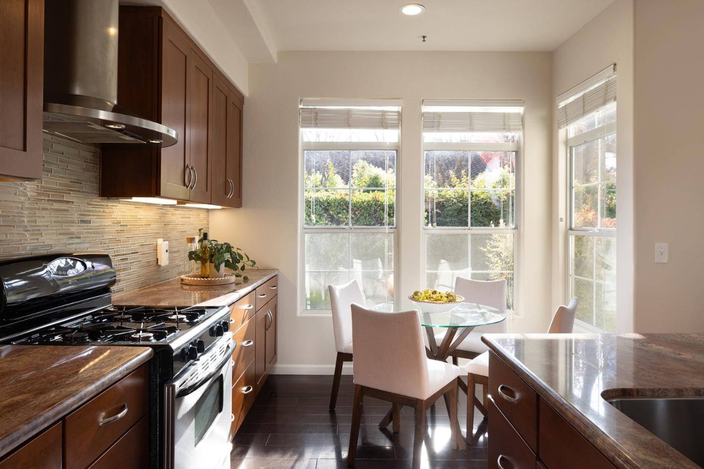 17776 Riverbend Road Salinas, CA 93908 - Photo 9 of 22 a kitchen with a stove and wooden floor