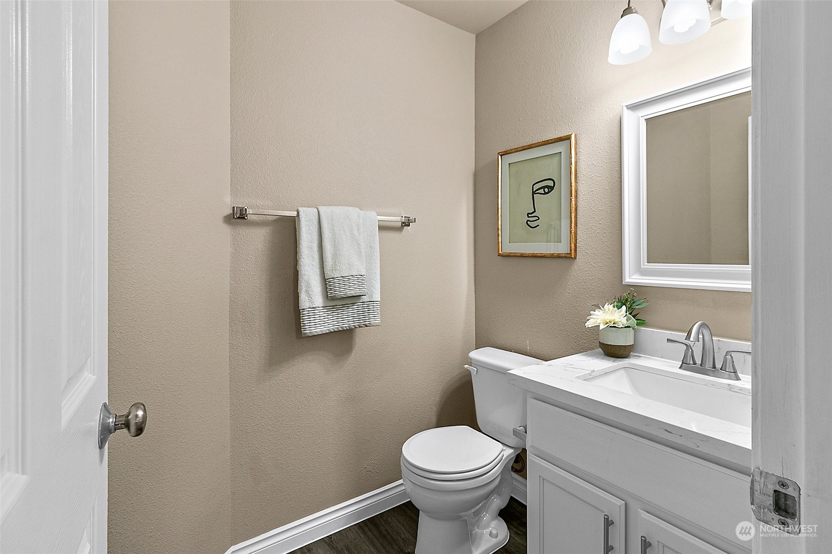 6723 Southeast 4th Street Renton, WA 98059 - Photo 11 of 38 a bathroom with a sink toilet and mirror