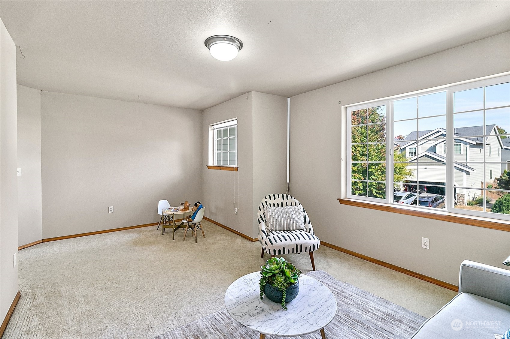 6723 Southeast 4th Street Renton, WA 98059 - Photo 21 of 38 a living room with furniture and a window
