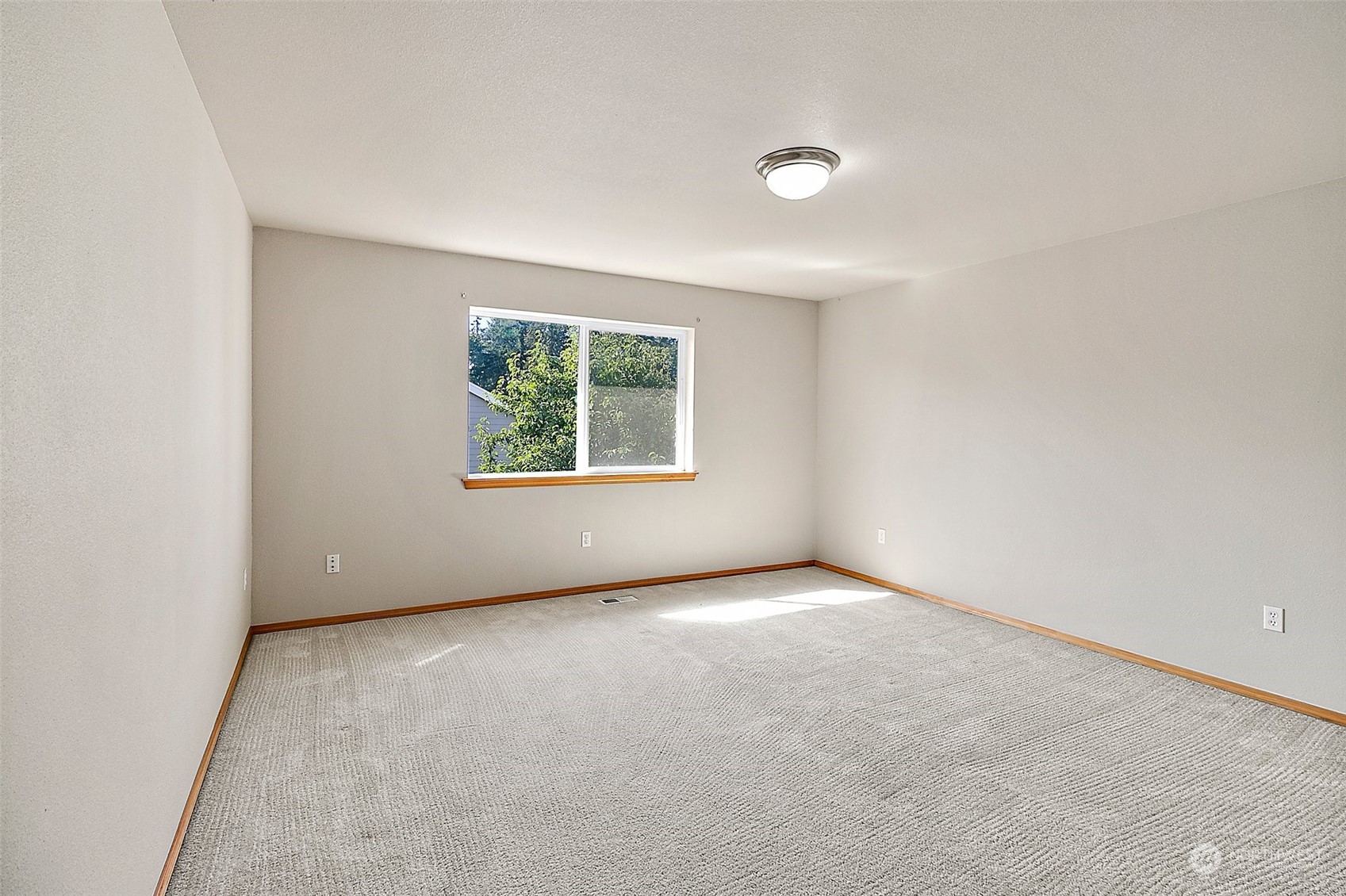 6723 Southeast 4th Street Renton, WA 98059 - Photo 22 of 38 an empty room with windows