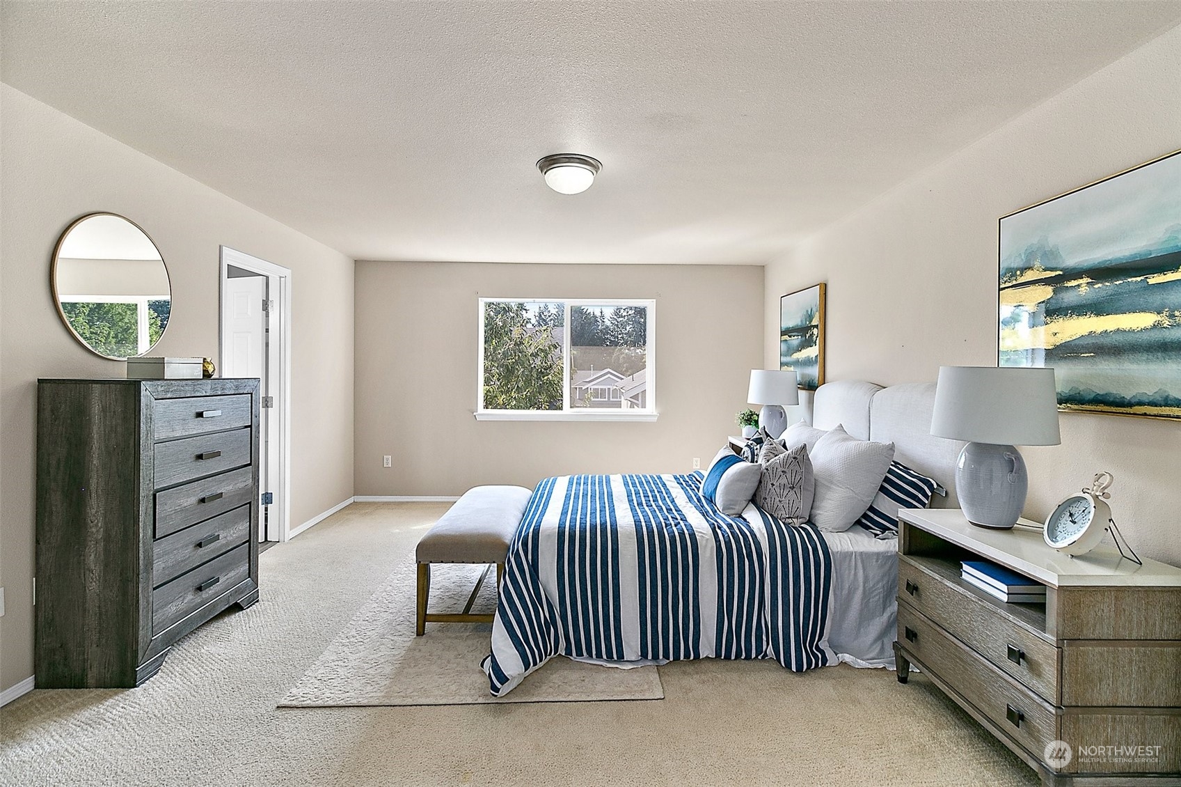 6723 Southeast 4th Street Renton, WA 98059 - Photo 24 of 38 a bedroom with bed and a window