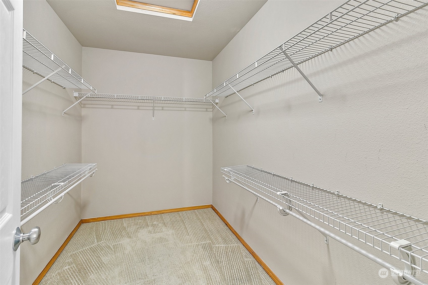 6723 Southeast 4th Street Renton, WA 98059 - Photo 27 of 38 a view of a room with racks on the wall