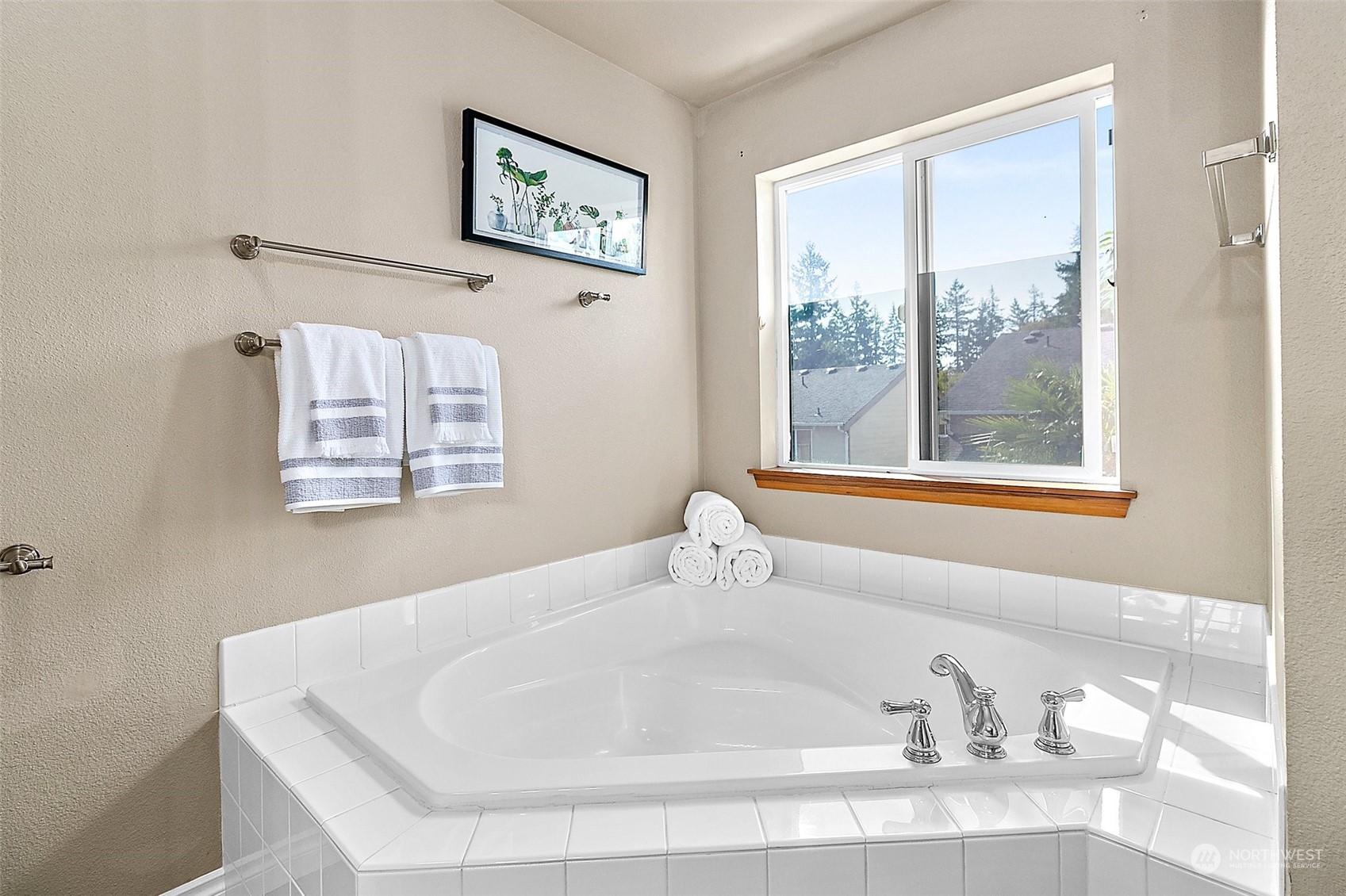 6723 Southeast 4th Street Renton, WA 98059 - Photo 30 of 38 a white bath tub sitting next to a window