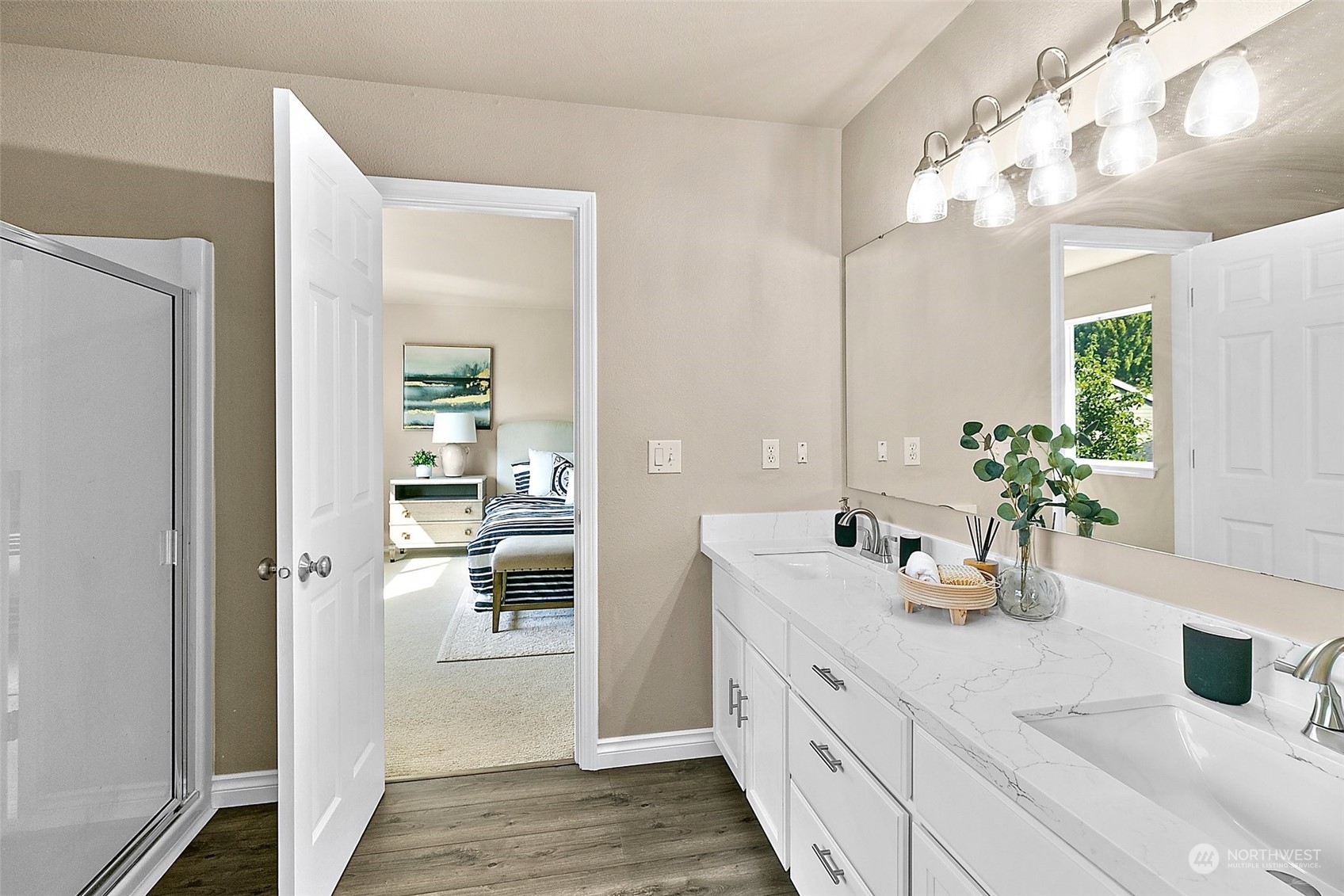 6723 Southeast 4th Street Renton, WA 98059 - Photo 31 of 38 a bathroom with a double vanity sink and a mirror