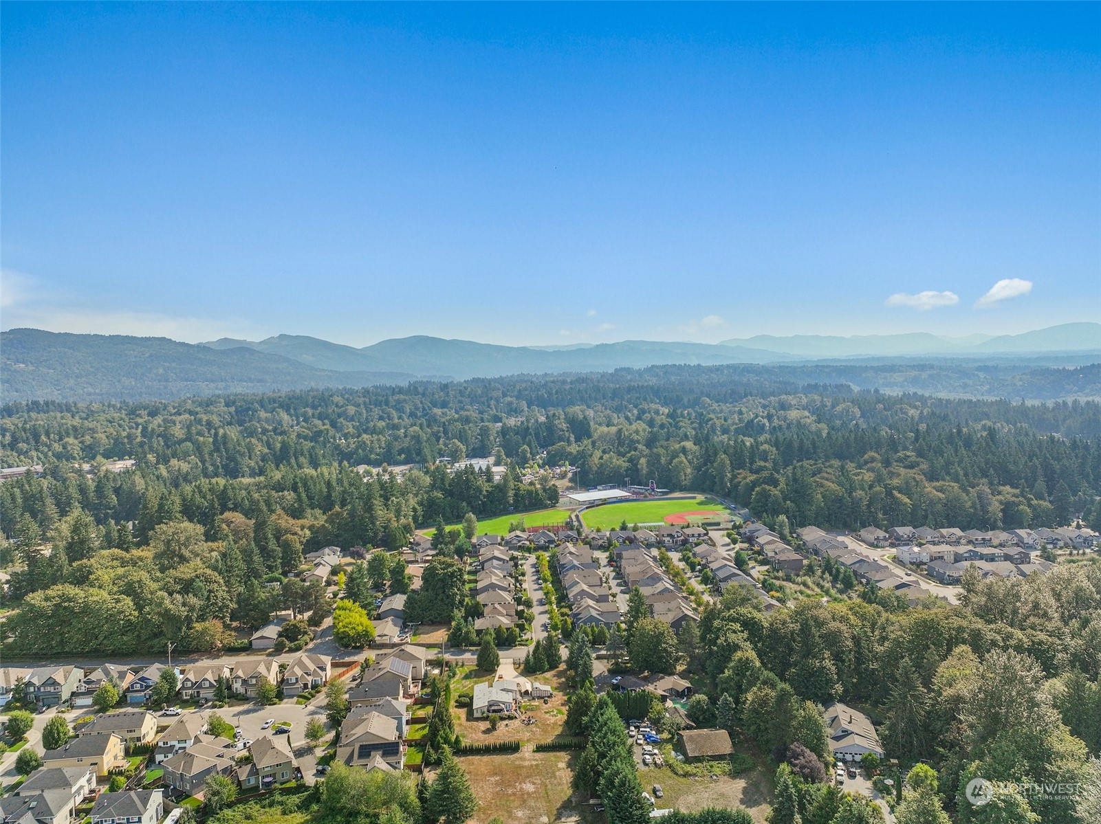 6723 Southeast 4th Street Renton, WA 98059 - Photo 38 of 38 a view of a city with mountains in the background