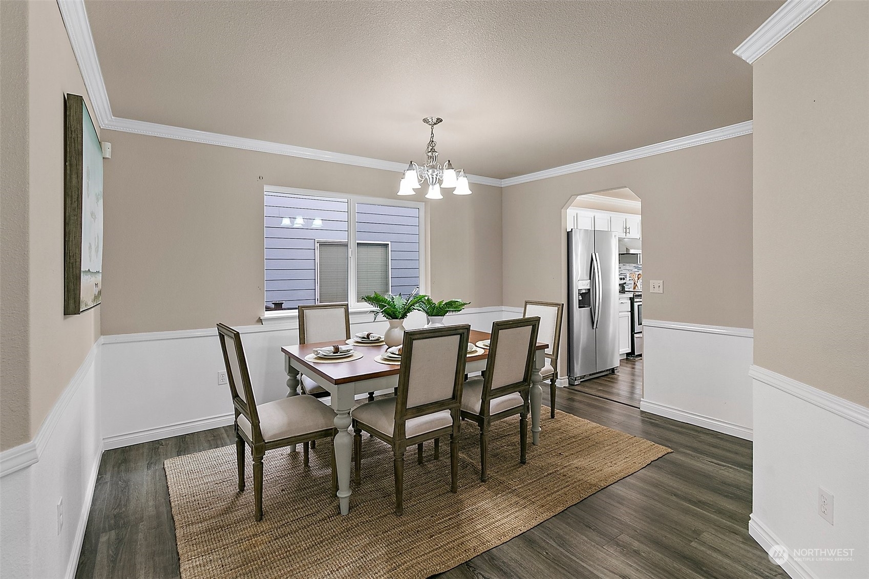 6723 Southeast 4th Street Renton, WA 98059 - Photo 5 of 38 a view of a dining room with furniture window and wooden floor