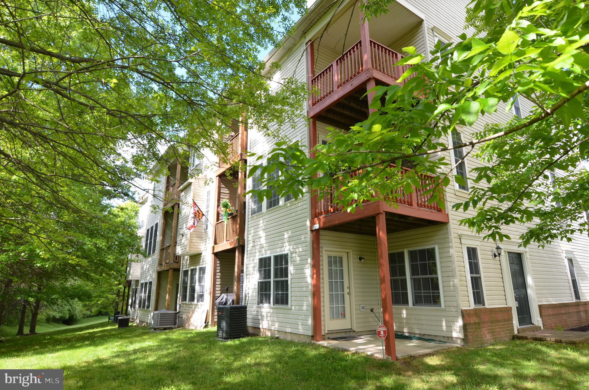 11023 Birchtree Lane Laurel, MD 20723 - Photo 22 of 22 Covered porch on each level