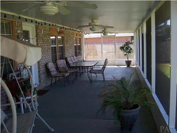 3693 Berrypatch Lane Pace, FL 32571 - Photo 3 of 22 55 X 12 Screened Porch...Great for entertaining!!