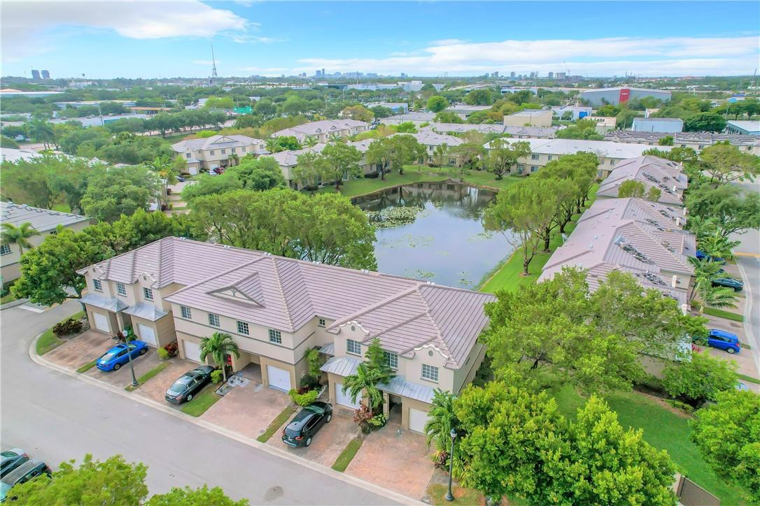 1999 Freeport Drive Riviera Beach, FL 33404 - Photo 1 of 1 an aerial view of a house with a lake view