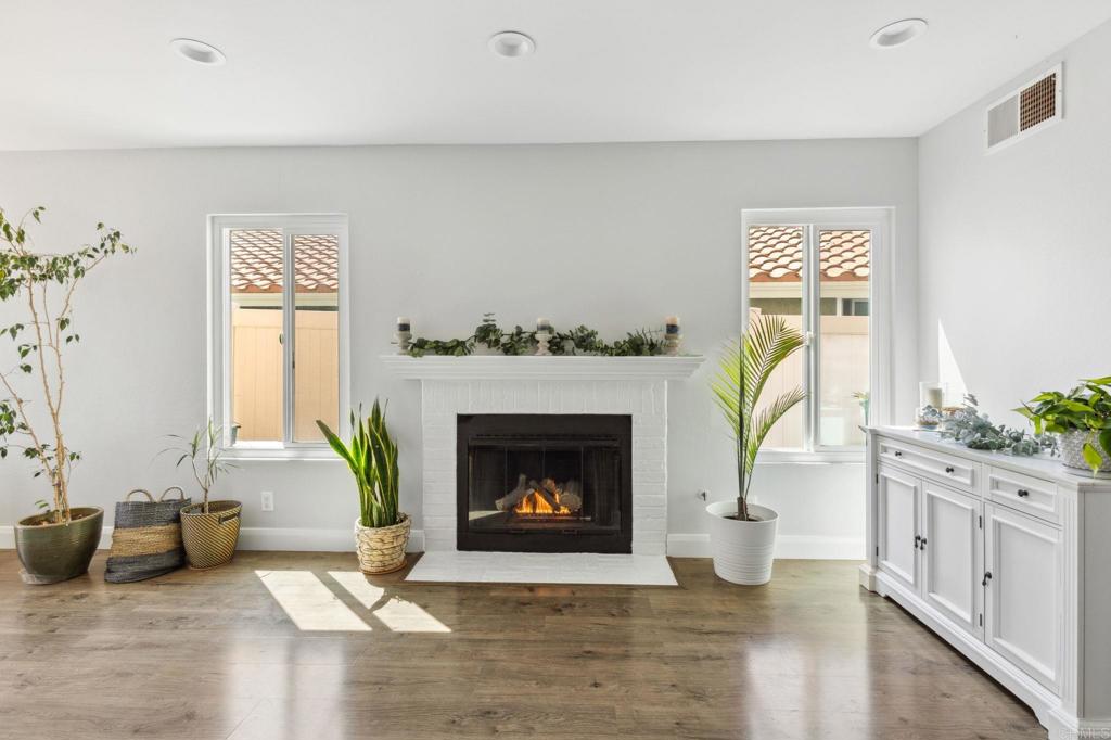 1896 Timber Trail Vista, CA 92081 - Photo 31 of 65 a living room with furniture and a fireplace
