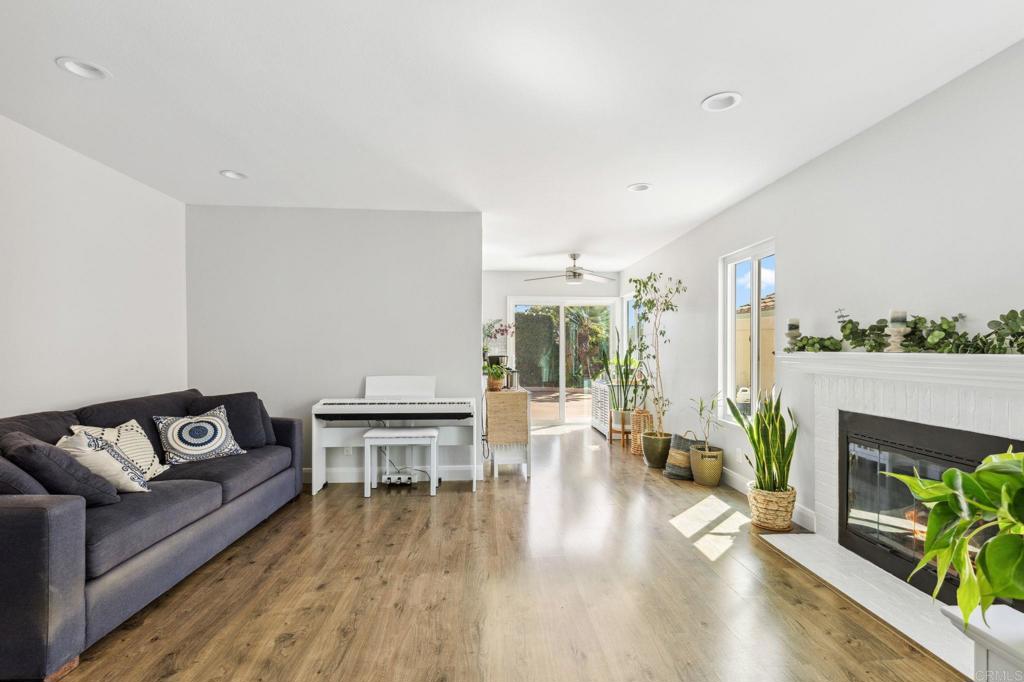 1896 Timber Trail Vista, CA 92081 - Photo 32 of 65 a living room with furniture and a fireplace