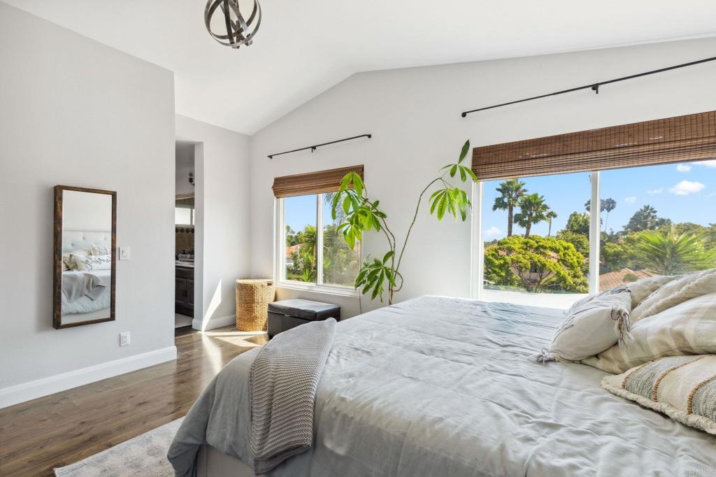 1896 Timber Trail Vista, CA 92081 - Photo 37 of 65 a bedroom with a bed and glass window