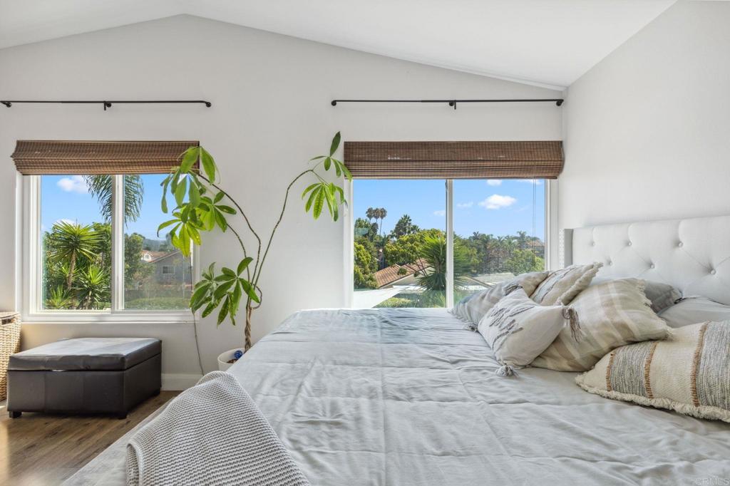 1896 Timber Trail Vista, CA 92081 - Photo 38 of 65 a bedroom with a bed and a couch