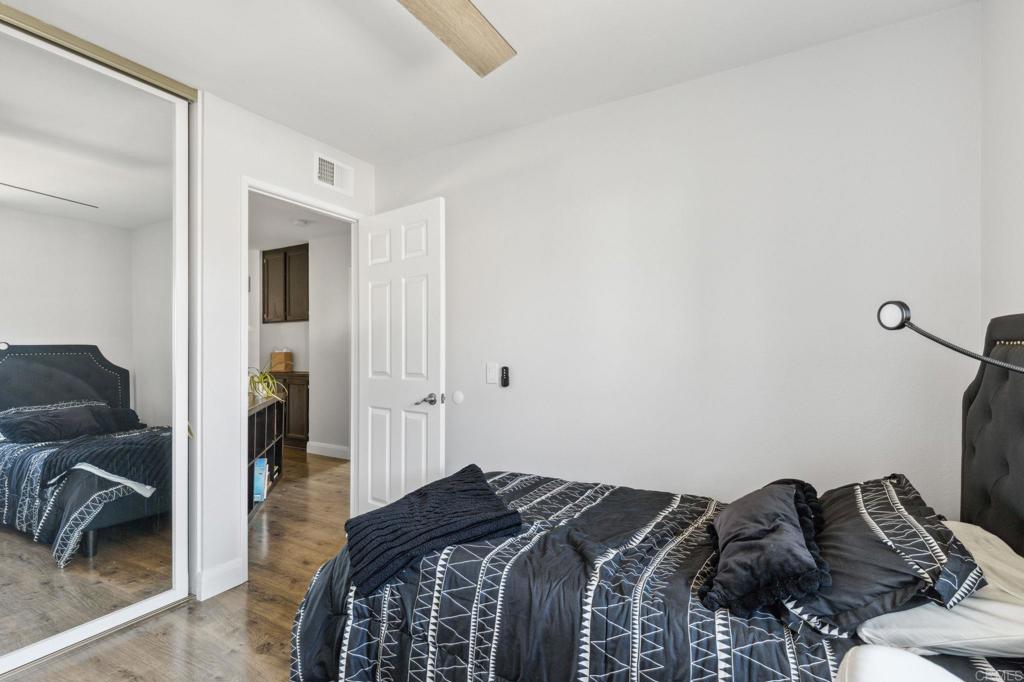 1896 Timber Trail Vista, CA 92081 - Photo 4 of 65 a bedroom with a bed and walk in closet