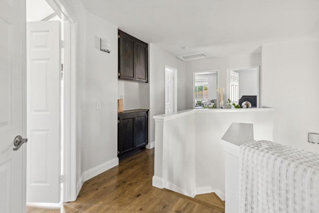 1896 Timber Trail Vista, CA 92081 - Photo 45 of 65 a view of a kitchen from the hallway with a sink
