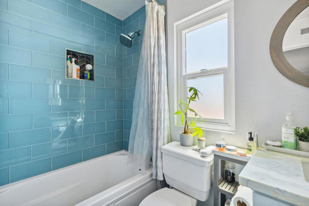 1896 Timber Trail Vista, CA 92081 - Photo 50 of 65 a bathroom with a sink mirror toilet and bathtub