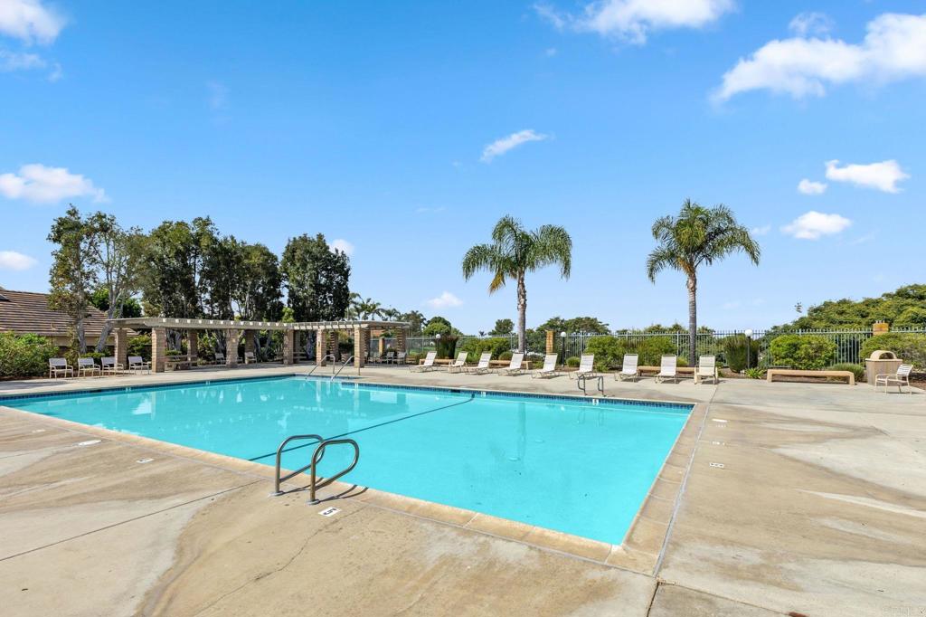1896 Timber Trail Vista, CA 92081 - Photo 57 of 65 a view of a swimming pool and lounge chair