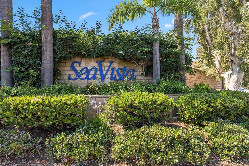 1896 Timber Trail Vista, CA 92081 - Photo 61 of 65 a sign that is sitting in front of flowers