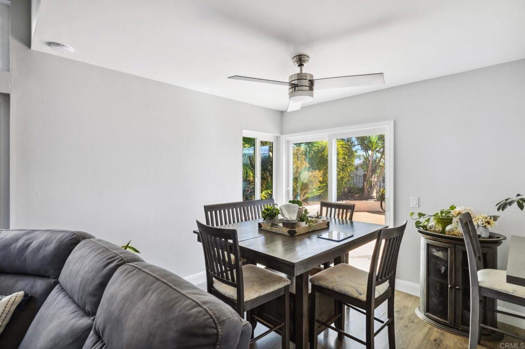 1896 Timber Trail Vista, CA 92081 - Photo 8 of 65 a view of a livingroom and dining room with furniture window and outside view
