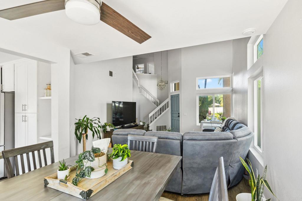 1896 Timber Trail Vista, CA 92081 - Photo 10 of 65 a living room with furniture and a flat screen tv