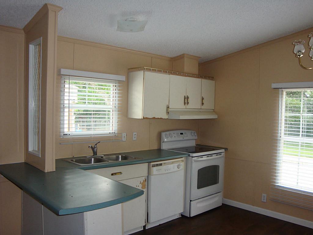 2449 Precinct Line Road Richmond, TX 77406 - Photo 4 of 11 Kitchen with breakfast bar