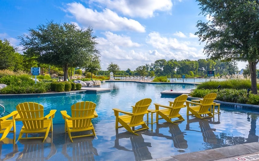 8210 Thunder Ridge Way Missouri City, TX 77459 - Photo 39 of 42 Saw Mill Lake Club Pool, one of 5 waterparks in Sienna to cool down the family and enjoy meeting your community.