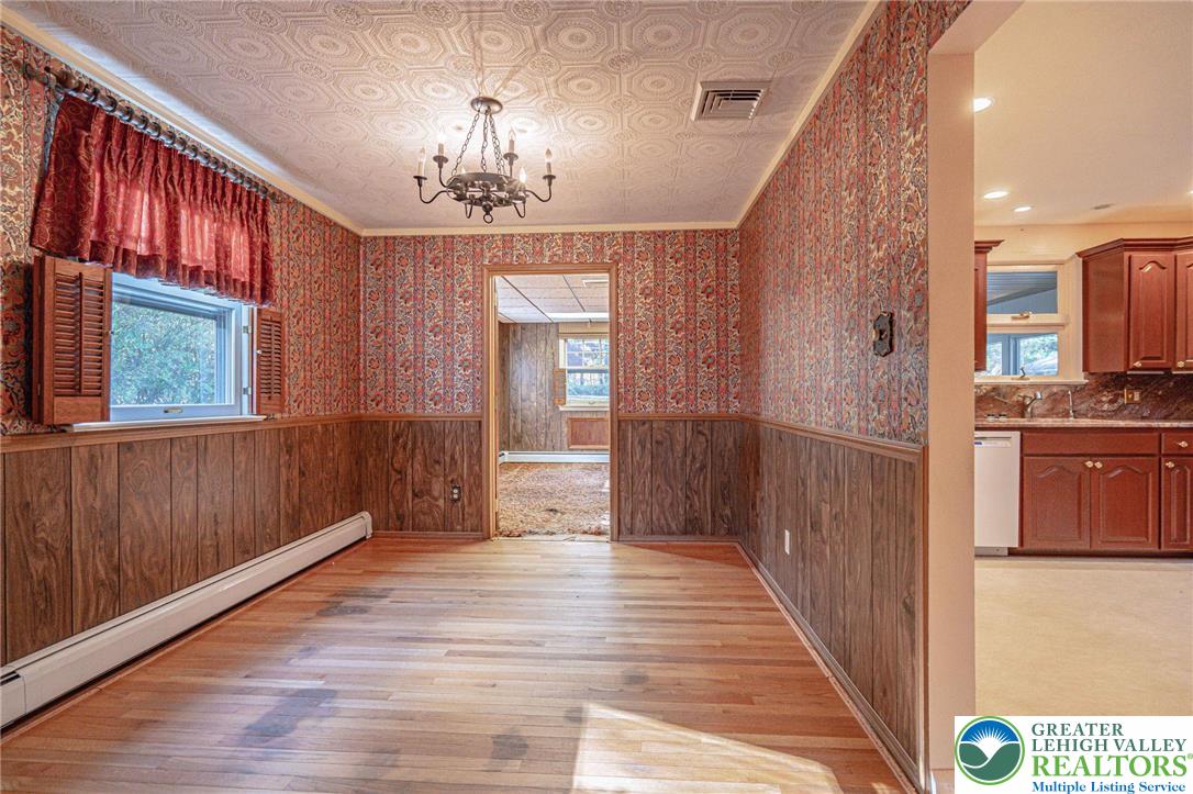 258 Kohlers Hill Road Kutztown, PA 19530 - Photo 15 of 60 a view of a hallway with wooden floor and staircase