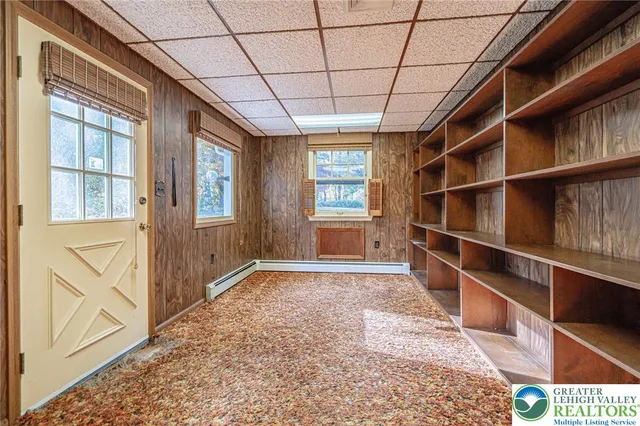 a kitchen with stainless steel appliances a refrigerator and a stove top oven