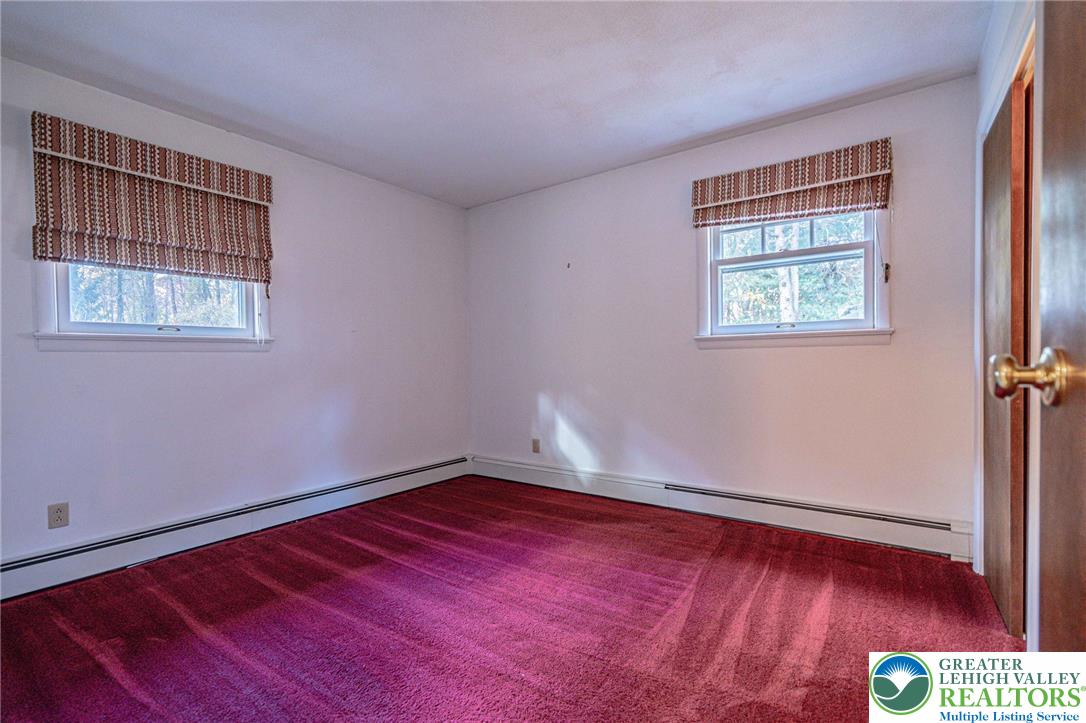 258 Kohlers Hill Road Kutztown, PA 19530 - Photo 32 of 60 a room with a bed and a window