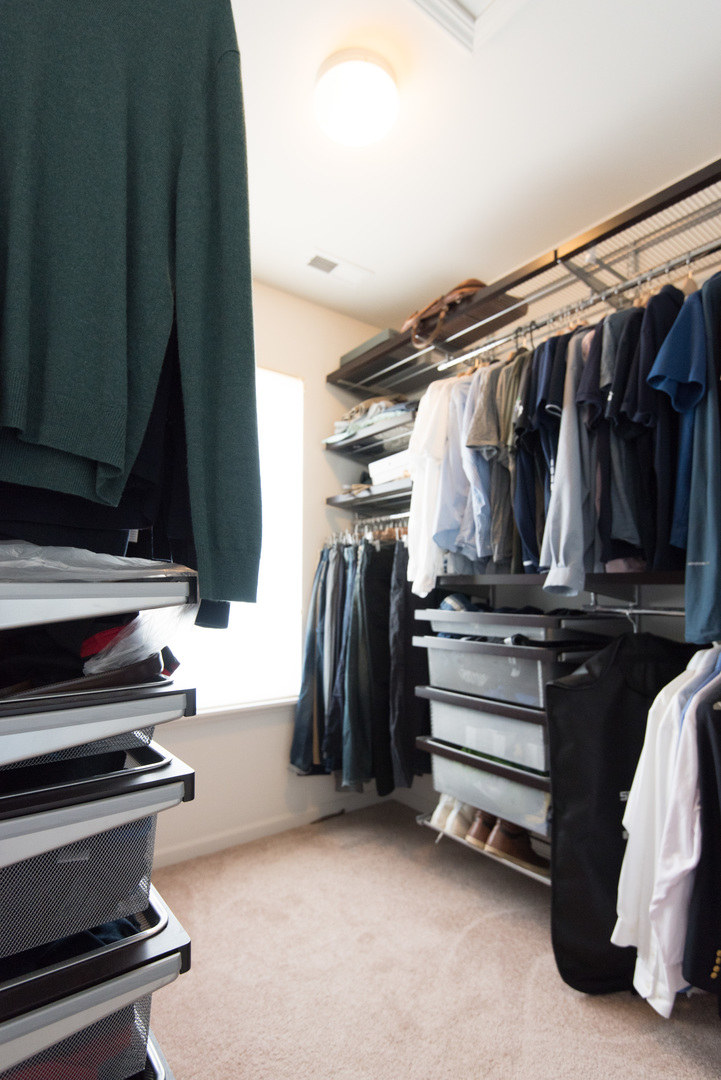 263 Aspen Pointe Road Vernon Hills, IL 60061 - Photo 11 of 16 a view of walk in closet with clothes and shoes