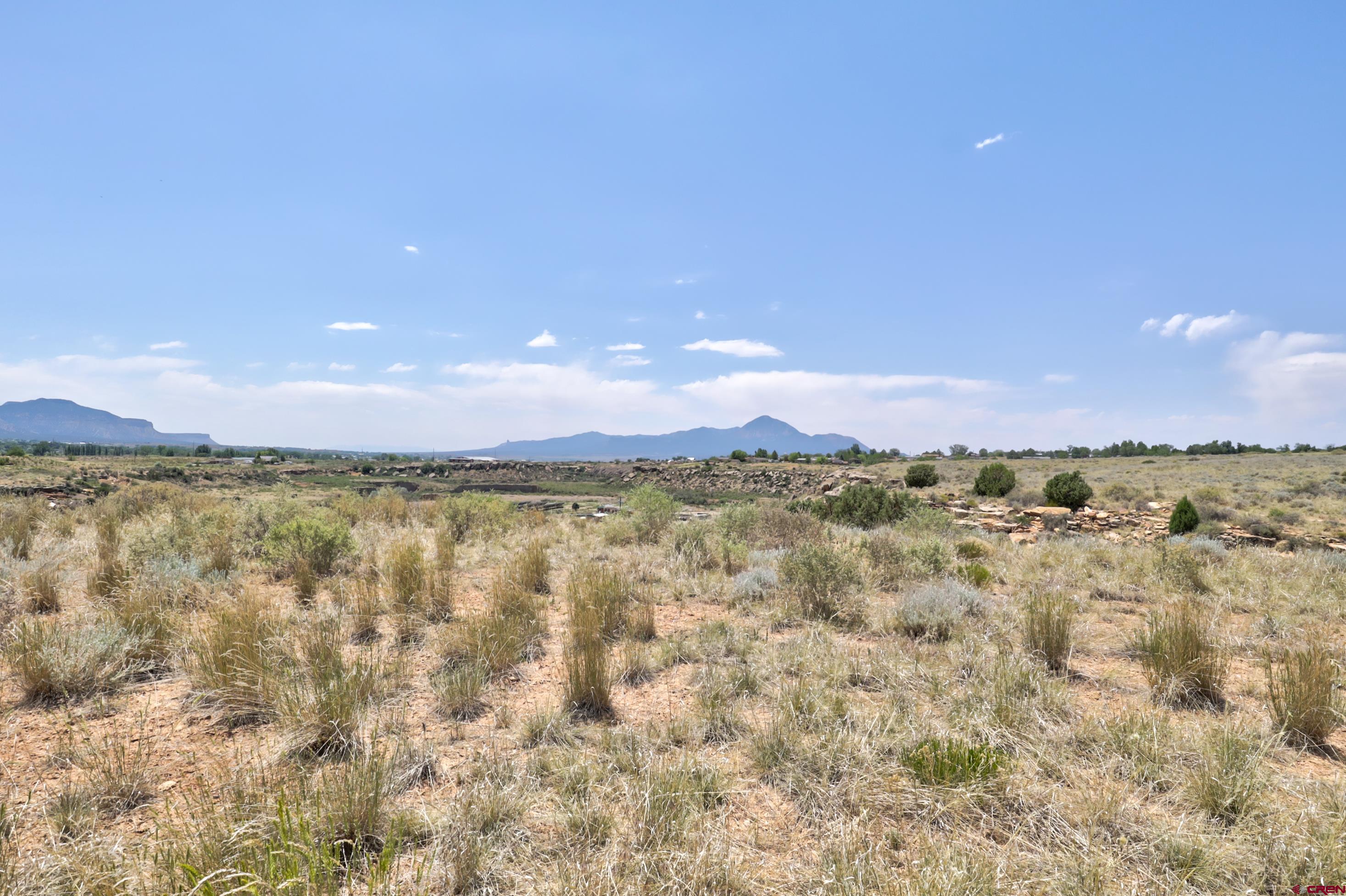 1125 Bluffs Boulevard Cortez, CO 81321 - Photo 13 of 29 a view of lake and mountain