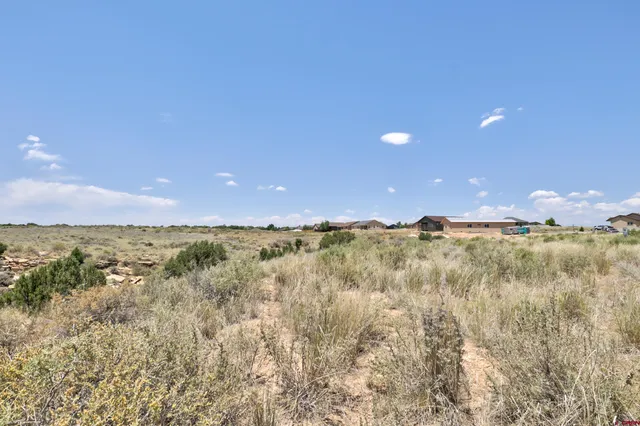 a view of an ocean and a mountain