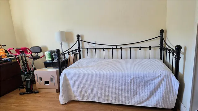 a view of a chairs and table in patio