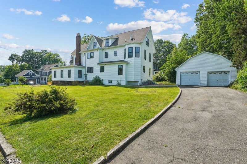 29 Arlington Road, Unit 1 Cranford, NJ 07016 - Photo 14 of 15 a view of a house with a yard
