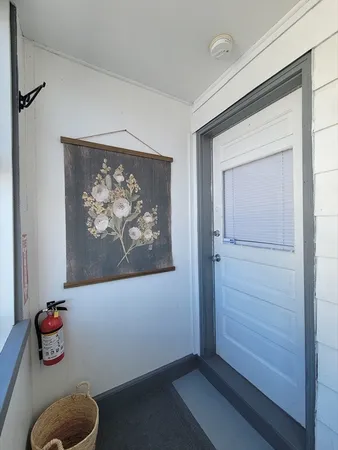 a view of wall painting and wooden floor