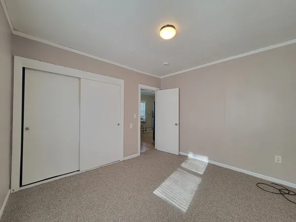 an empty room with an entryway