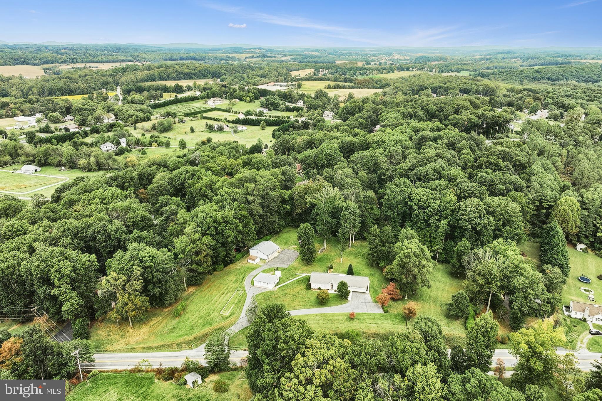 1063 Porters Road Spring Grove, PA 17362 - Photo 11 of 56 a view of a city with lush green forest