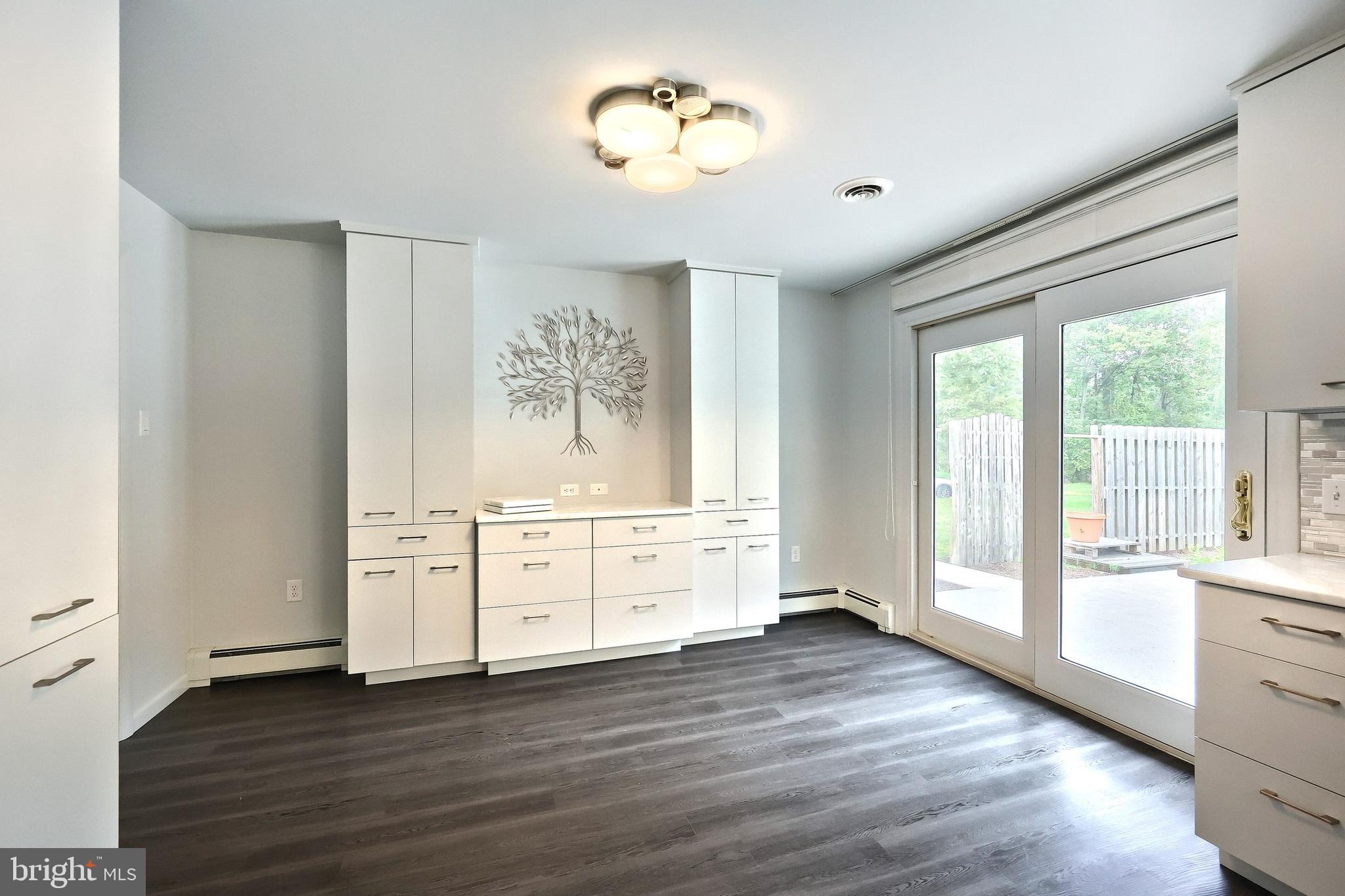 1063 Porters Road Spring Grove, PA 17362 - Photo 25 of 56 a view of a kitchen with wooden floor and a window