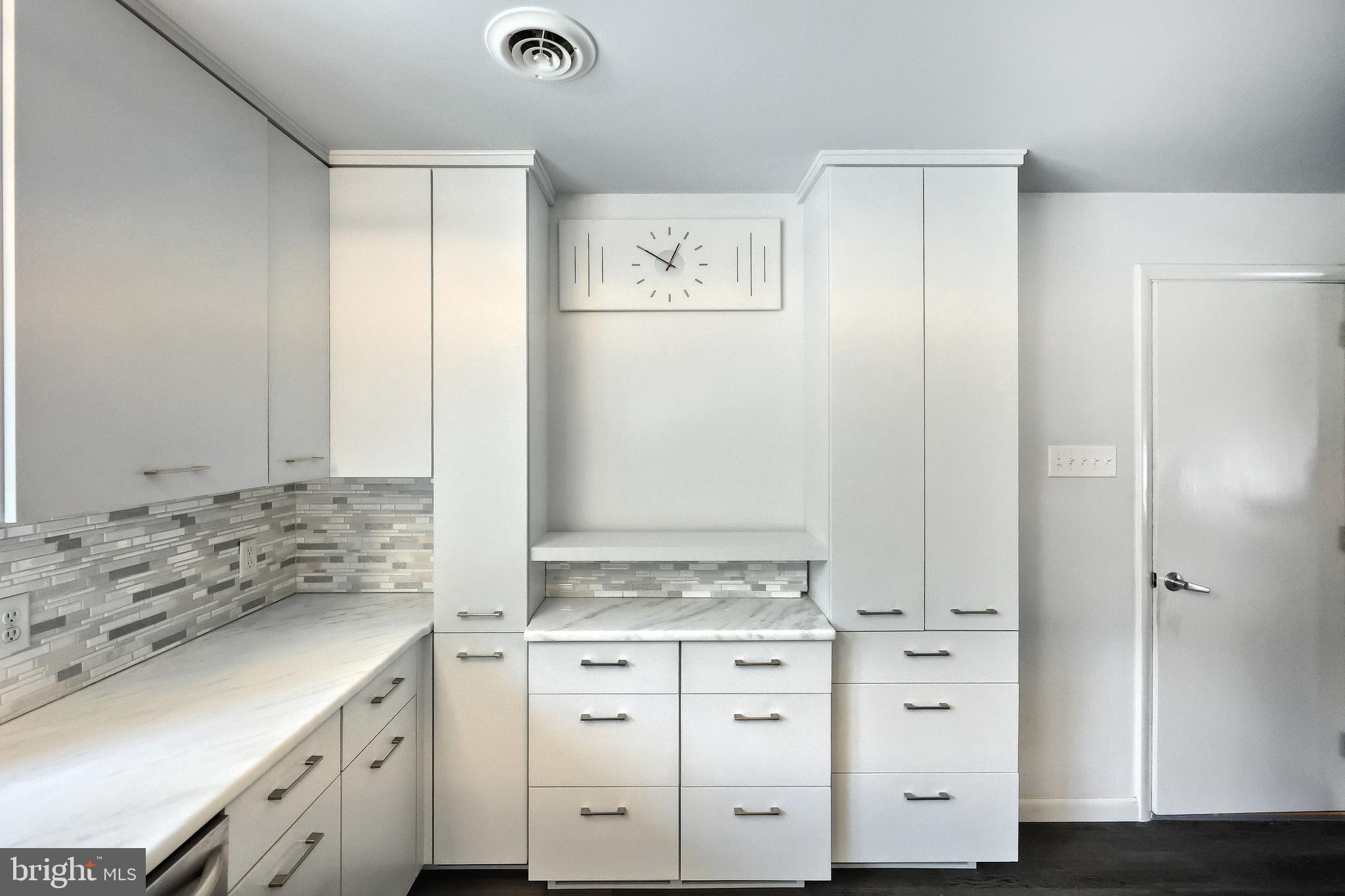 1063 Porters Road Spring Grove, PA 17362 - Photo 26 of 56 a bathroom with a granite countertop sink and a stove